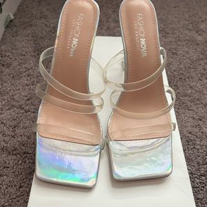 Clear holographic heels